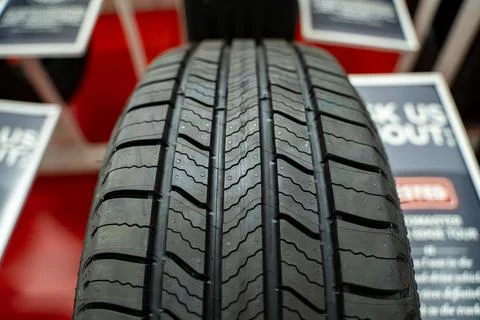 Close up of car tire tread pattern on display. Stock Photos