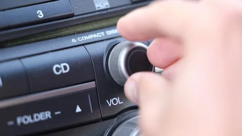 Close-up of Car Volume Knob Being Adjustment Up and Then Down Stock Footage 263987172