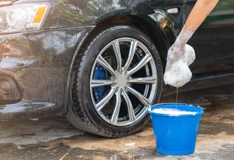 Close up car wheel wash. Stock Photos
