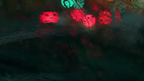 Close up of car windshield in the rain Stock Footage 243769991