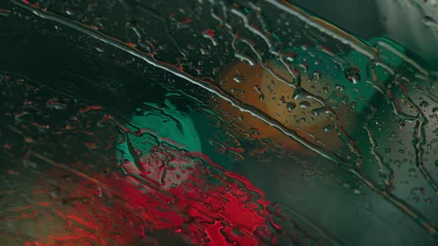 Close up of car windshield in the rain Stock Footage 243770883