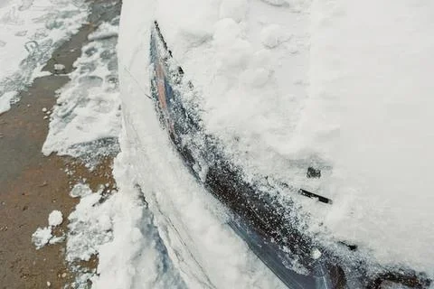Close-up of a car windshield with snow and ice buildup Stock Photos