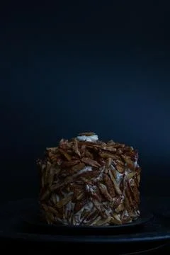 Close-up of Caramelized Almond Croquant Cake on Elegant Plates Stock Photos