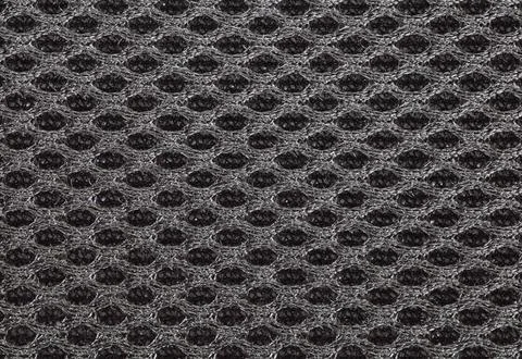 Close - up carbon fiber mesh pattern and background Foto stock