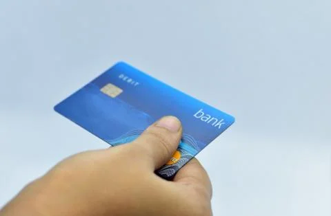 Close of card in hand Stock Photos