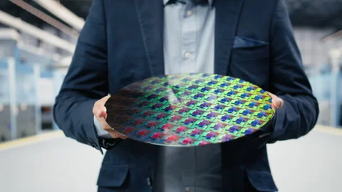 Close up of careful hardware designer carrying semiconductor substrates Stock Footage 333392359