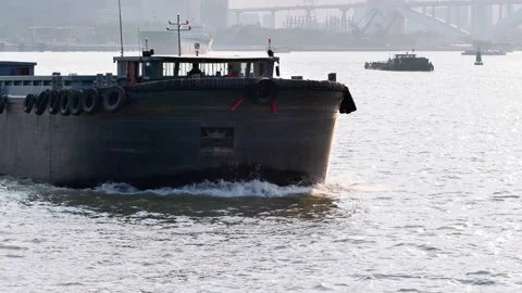 Close up of the cargo ship's prow sailing in Huangpu river Stock Footage 135619435