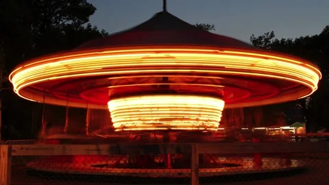 A close up of a carousel time-lapse as it spins in a circle. Stock Footage 147977053