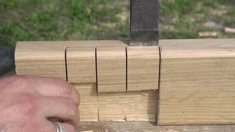 Close-up of carpenter chiseling with chisel Stock Footage 107679781