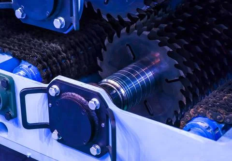 Close-up of a carpenter using a circular saw to cut a large board of wood Stock Photos