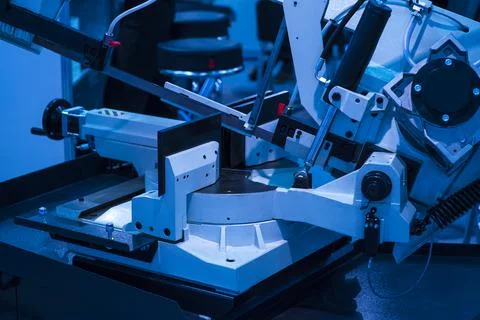 Close-up of a carpenter using a circular saw to cut a large board of wood Stock Photos