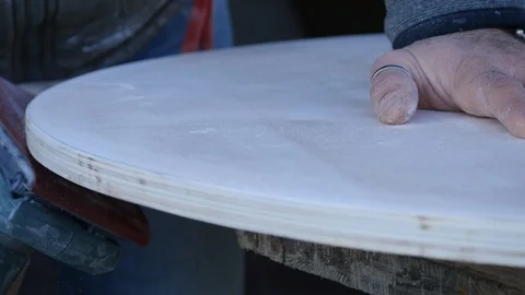 Close up of carpenter that work on woodworking using electric sander for wood. Stock Footage 99781459
