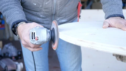 Close up of carpenter that work on woodworking using electric sander for wood. Stock Footage 99782205