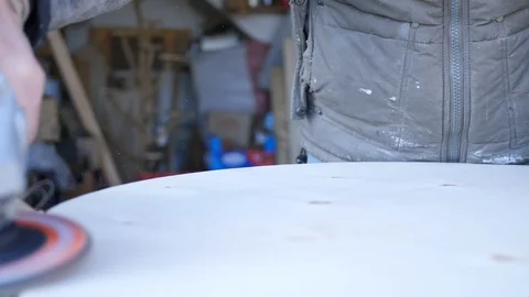 Close up of carpenter that work on woodworking using electric sander for wood. Stock Footage 99782858
