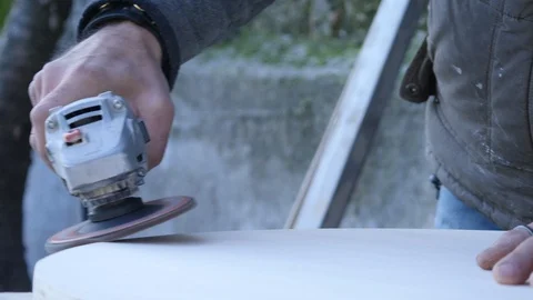 Close up of carpenter that work on woodworking using electric sander for wood. Stock Footage 99783531