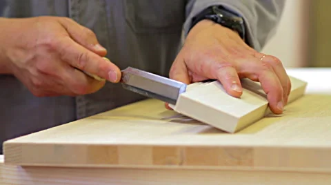 Close up of carpenter working with chisel. Cabinet maker at work. Video stock 63978346