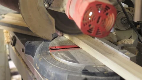 Close-up of a carpenter working with a pneumatic pistol. A professional Stock Footage 201053140