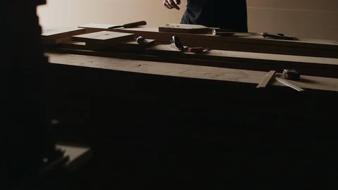 Close-up of a Carpenter working on a Wooden Video stock 89304163