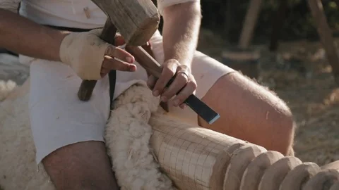 Close-up of the carpenter's hands with the chisel Stock Footage 79996943