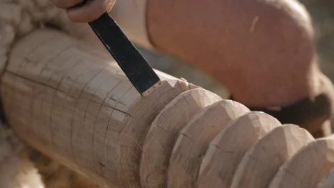 Close-up of the carpenter's hands with the chisel Stock Footage 79997074