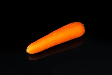 Close up Carrot on black Stock Photos