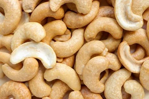 Close up of cashew nuts pattern texture. Cashew nuts full macro shoot  Fotos de archivo