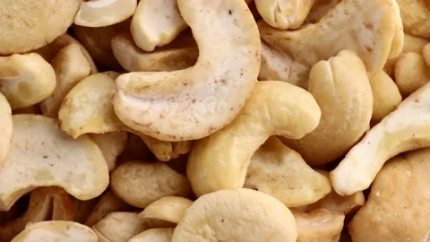 Close up of cashew nuts, rotation in circle. natural cashew nuts Turning. Stock Footage 232899065