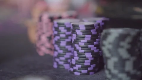 Close-up of casino chips at a poker table Stock Footage 247279670