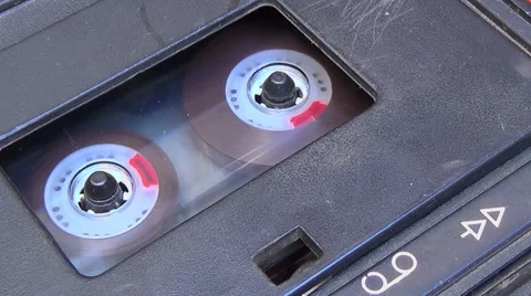 Close up to a cassette tape deck when a finger start and stop playing. Stock Footage 65659568