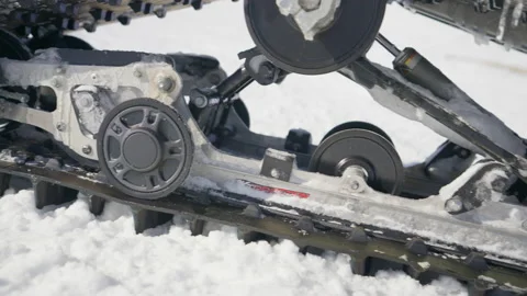Close up of caterpillar track on snowmobile Video stock 223851681