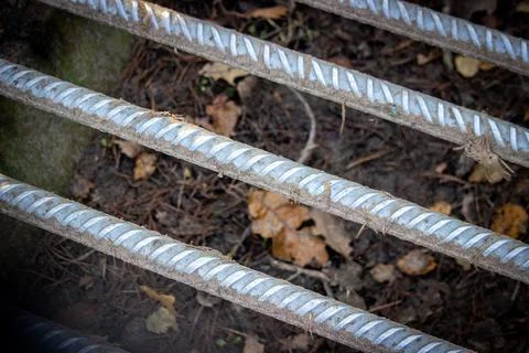 Close up of cattle rack on the ground to prevent animals leaving the area Stock Photos