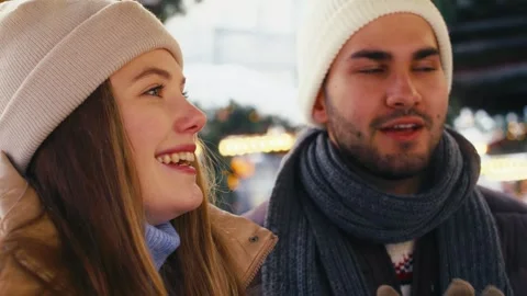 Close up of caucasian couple having fun on Christmas market Stock-Footage 274142744