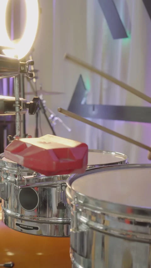 Close up of a caucasian drummer hands playing drums with drumsticks Stock Footage 202214584
