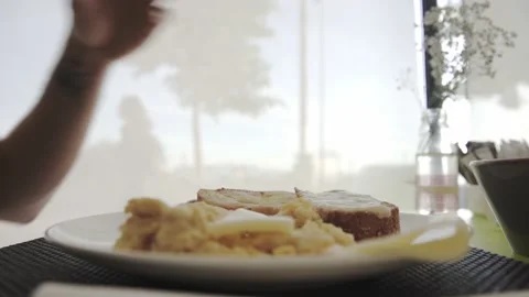 Close up caucasian hand having some food in restaurant Stock Footage 153510408