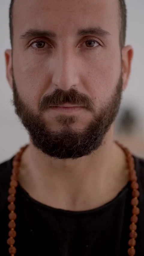 Close up Caucasian man with beard doing yoga meditation. Middle-aged male Stock Footage 269239074