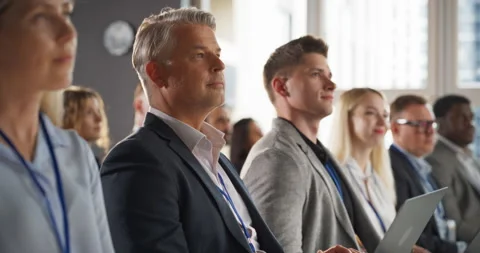 Close Up Of Caucasian Man In Crowd At Crypto Conference Stock Footage 255841032