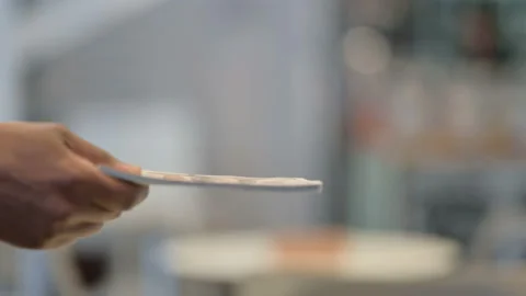Close Up of Caucasian Man taking Dollars from African Man Stock Footage 146478967