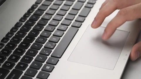 Close up, caucasian man using touchpad, trackpad on laptop with his hand  Stock Footage 138040411