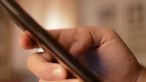 Close-up caucasian man's hand using telephone for communication. 스톡 동영상 209184595