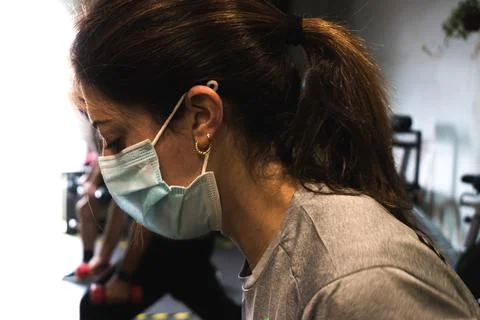 Close-up of a caucasian woman training with a surgical mask Stock Photos
