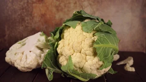 Close up of cauliflower cabbage on dark rustic background Stock Footage 137096370