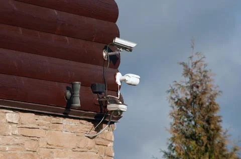 Close up of CCTV camera over defocused background with copy space Stock Photos