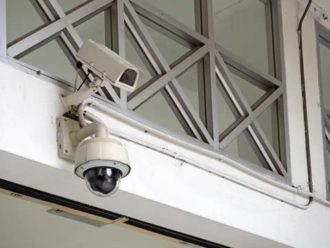 Close up CCTV Security Camera or Closed Circuit Television on The Wall Stock Photos