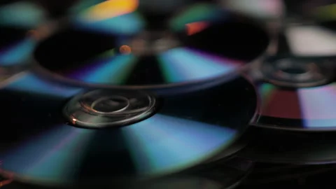 Close Up of CD and DVD Recordable Digital Media, Vintage Data and Video Stock Footage 143966729