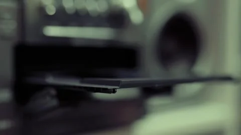 Close up of cd discs in an old musical center. Technology concept. Stock Footage 301556109