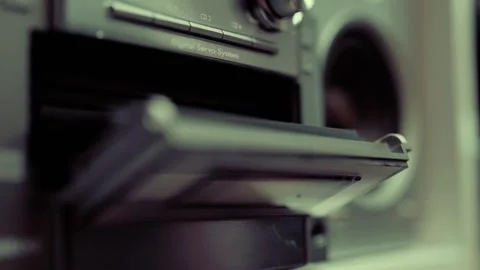 Close up of cd discs in an old musical center. Technology concept. Stock Footage 301556403
