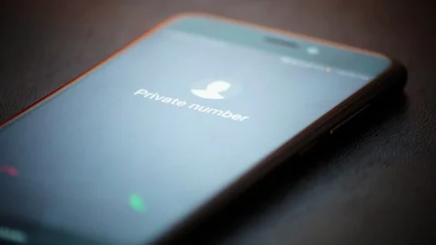 Close up of a Cell Phone during a call from an unknown number Stock Footage