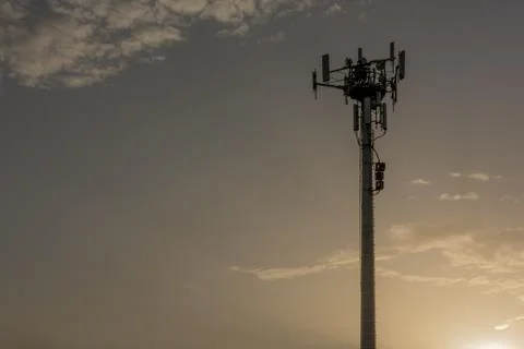 Close Up of Cellphone Tower at Sunset Stock Photos