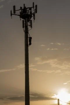 Close Up of Cellphone Tower at Sunset Stock Photos