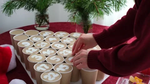 Close the cells of the Advent calendar made with your own hands from cardboard Stock Footage 316891593